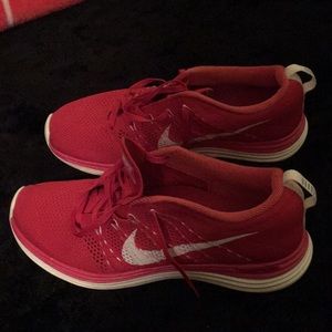 Women’s red Nike shoes